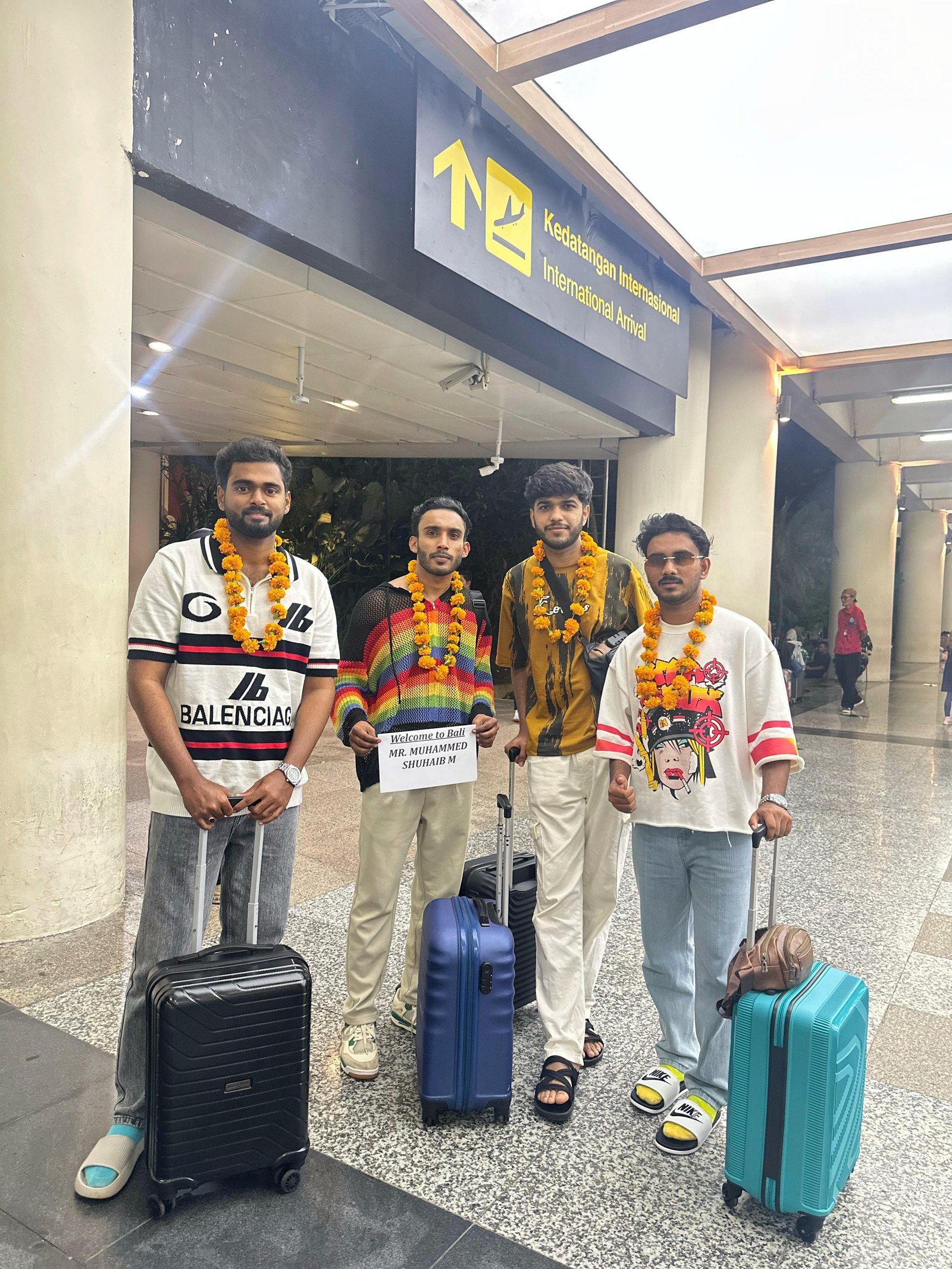 Family taking a photo in front of a landmark